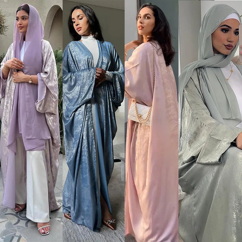 عباية فاخرة بتصميم لامع للمناسبات  ، تجمع بين الأناقة والراحة بفضل قماش التوينغ الساتان الفاخر.